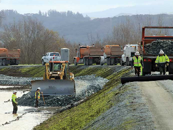 digger expanding lake